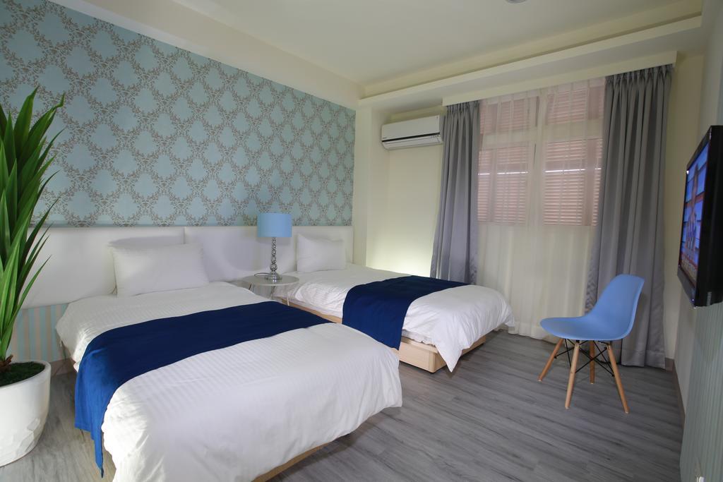 กั๋วเฉิน โฮเต็ล Hotel หลัวตง ภายนอก รูปภาพ